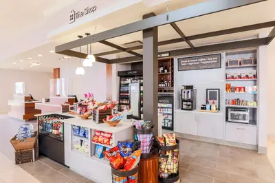 a grocery store with a counter in a store at Hilton Garden Inn Reno in Reno
