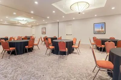 a conference room with tables and chairs in it at Hilton Garden Inn Reno in Reno