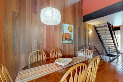 a dining room with a wooden table and chairs at Kingswood Retreat in Kings Beach