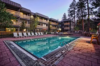 a swimming pool in front of a building at Hotel Azure in South Lake Tahoe