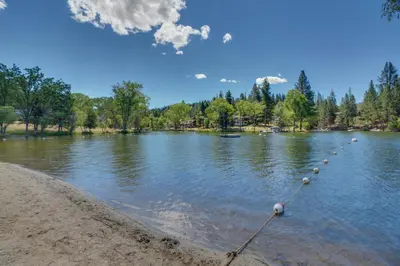 a river with a bunch of buoys in the water at Lake Lodge Beach (04-040) in Groveland