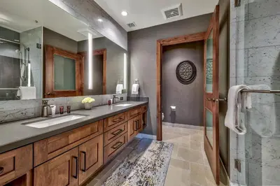 a bathroom with two sinks and a shower at Luxury Three Bedroom Residence Steps From Heavenly Village Condo in South Lake Tahoe