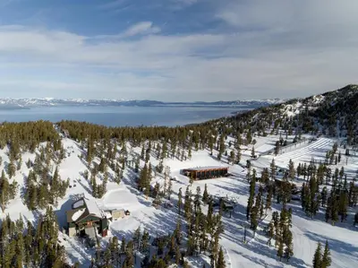 an aerial view of a ski lodge in the snow at Luxury Three Bedroom Residence Steps From Heavenly Village Condo in South Lake Tahoe