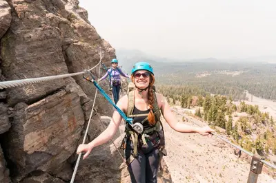 two people climbing on a rock wall at Summit Condominium #267 Condo in Mammoth Lakes