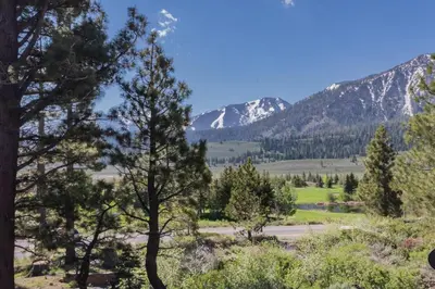 a view of a valley with mountains in the background at Creekhouse 1320 in Mammoth Lakes