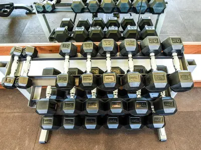a bunch of dumbbells on a rack in a gym at Luxury 2Br Residence Steps From Heavenly Village & Gondola Condo in South Lake Tahoe