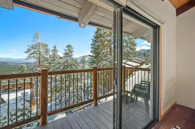 a balcony with a view of the mountains at Timber Ridge Resort by 101 Great Escapes in Mammoth Lakes