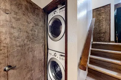 a laundry room with a washer and dryer at Cherry Retreat in South Lake Tahoe