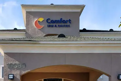a sign on the top of a building at Comfort Inn & Suites Galt - Lodi North in Galt