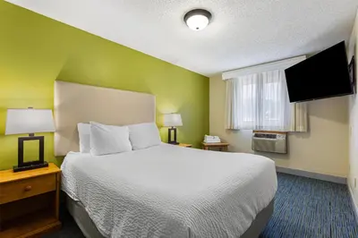 a hotel room with a bed and a window at Best Western Hi-Desert Inn in Tonopah