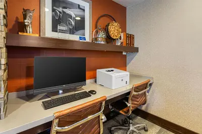 a desk with a computer and a printer on it at Best Western Hi-Desert Inn in Tonopah