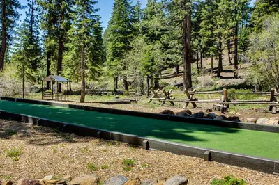 a pool of green water in a park at 2 Bed 2 Bath Apartment in Carnelian Bay in Carnelian Bay