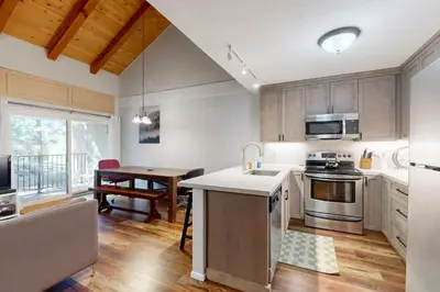 a kitchen with a sink and a stove top oven at 2 Bed 2 Bath Apartment in Carnelian Bay in Carnelian Bay