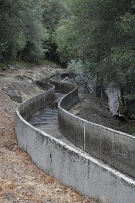 a set of concrete barriers on a hill with trees at Yosemite Foothill Retreat - Private Guest Suite #3 in Coarsegold
