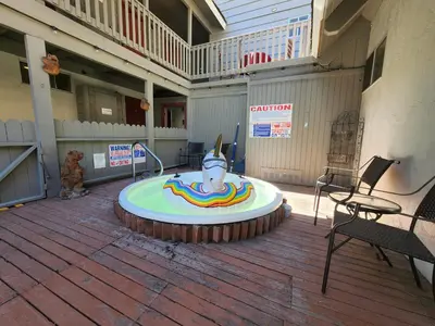 a large cake sitting on top of a patio at Cinnamon Bear Inn in Mammoth Lakes