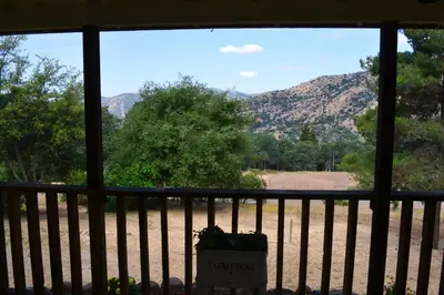 a view of a mountain from a window at The Quail's Nest in Three Rivers