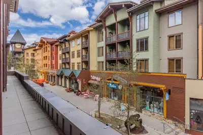 a row of buildings on a city street at Village 3211 in Mammoth Lakes