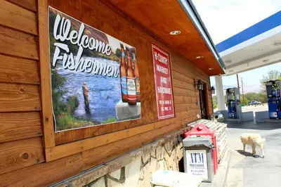a sign on the side of a gas station at Bristlecone Motel in Big Pine