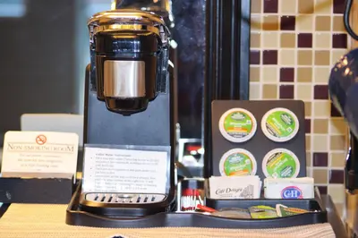 a coffee maker sitting on top of a table at The Alder Inn in South Lake Tahoe