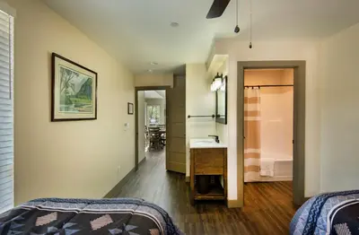 a bedroom with a sink and a bathroom at 11R Spring Meadow Retreat in Wawona