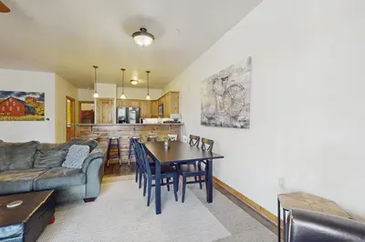 a living room with a couch and a table at Dolomite Delight in Truckee