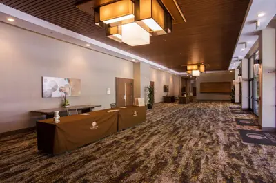 a lobby of a hotel with a large room at DoubleTree by Hilton Fresno Convention Center in Fresno