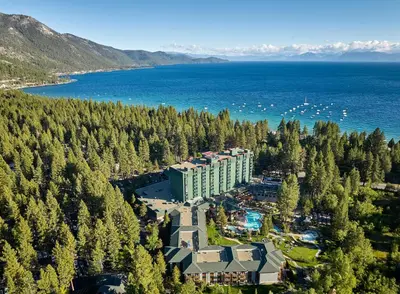 an aerial view of a resort with trees and the ocean at Hyatt Regency Lake Tahoe Resort, Spa & Casino in Incline Village
