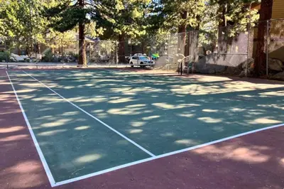 a tennis court with a car parked on it at Sherwin Villas 39 in Mammoth Lakes