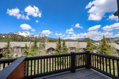 a balcony with a view of the mountains at Snowcreek V #997 Condo in Mammoth Lakes