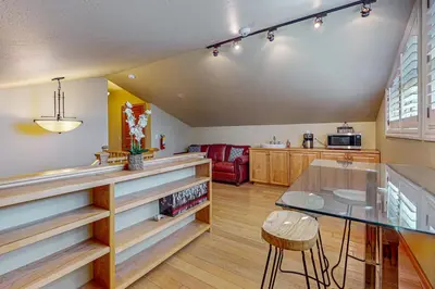 a kitchen with a glass table and a dining room at The Lake Labyrinth in Zephyr Cove