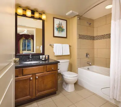 a bathroom with a tub and a toilet and a sink at WorldMark South Shore in Zephyr Cove