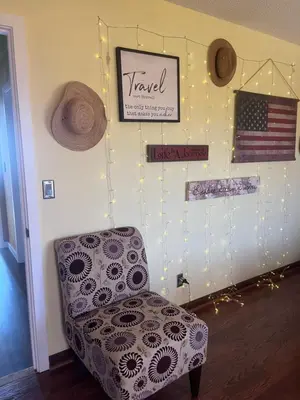 a room with a chair and an american flag at McMillan Ranch Yosemite in Coarsegold