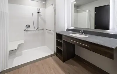 a bathroom with a sink and a shower at My Place Hotel-Carson City, NV in Carson City