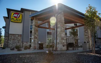 a large building with a pizza place sign on it at My Place Hotel-Carson City, NV in Carson City