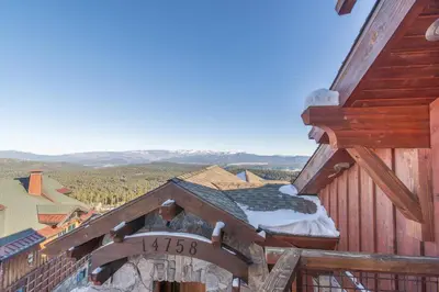 a view from the top of a building with a balcony at Skislope-Tahoe Villa in Truckee