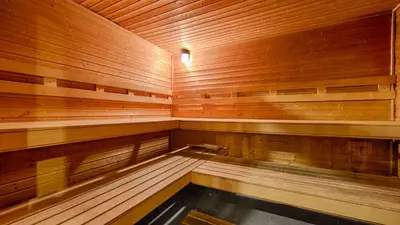 a swimming pool in a wooden sauna at Best Western Plus Rama Inn & Suites in Oakdale