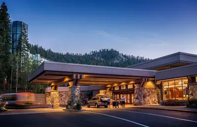 a building with a car parked in front of it at Everline Resort and Spa, Lake Tahoe in Olympic Valley
