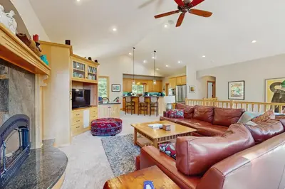 a living room with a couch and a fireplace at Agate Road Retreat in Carnelian Bay