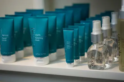 a row of bottles of lotion on a shelf at The Landing Resort and Spa in South Lake Tahoe