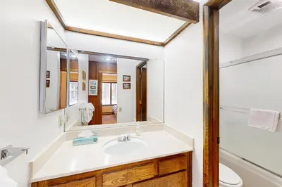 a bathroom with a sink and a mirror at Horizons 4 143 in Mammoth Lakes