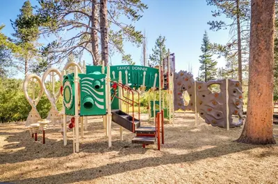 a playground in a park with a slide at Tastefully-Updated, Classic Tahoe Family Home in Truckee