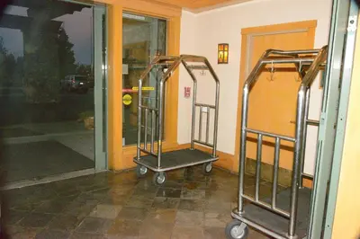 two metal trolleys in front of a door at Juniper Springs Lodge #238 in Mammoth Lakes