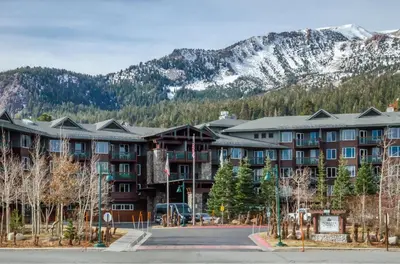 a view of a resort with mountains in the background at Juniper Springs Lodge #238 in Mammoth Lakes