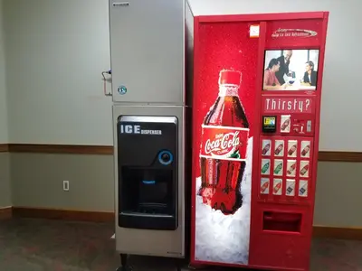 a coca cola vending machine with a coke bottle at Juniper Springs Lodge #543 in Mammoth Lakes