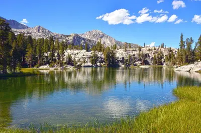 a large lake in the middle of a mountain at White Mountain Lodge #2329 in Mammoth Lakes