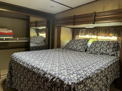 a bedroom with a bed in a room at Sequoia Forest Retreat in Badger