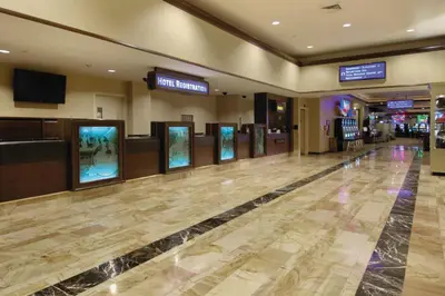 a hotel lobby with a check in counter at Harrah's Lake Tahoe, A Caesars Destination in Stateline