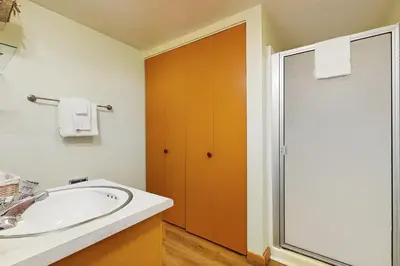 a bathroom with a sink and a shower at Scott Peak Views in Alpine Meadows