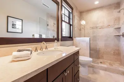 a bathroom with a sink and a toilet and a shower at Mountainside 15 in Mammoth Lakes