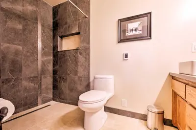 a bathroom with a toilet and a shower at Cozy Lake-View Hideaway! Pet-Friendly Truckee Home in Truckee